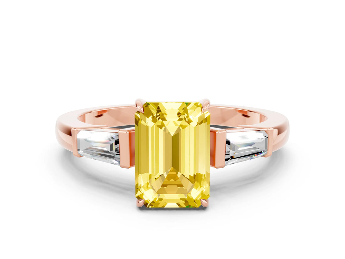 Rose gold Emerald Cut Cut Diamond Ring with Tapered Baguette Side Stones in Four-Prong Setting