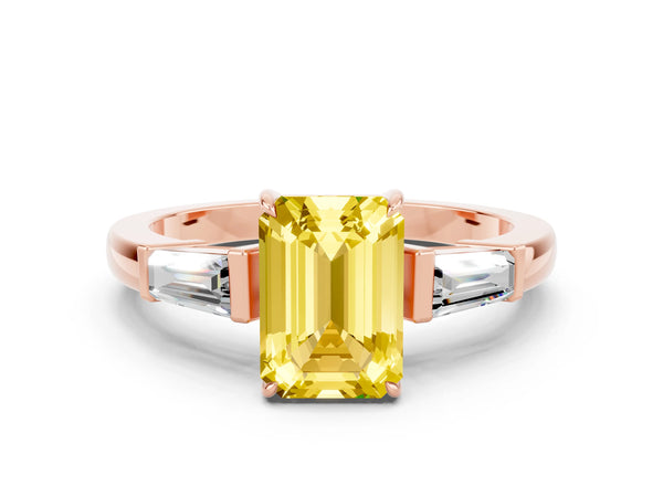 Rose gold Emerald Cut Yellow Sapphire Three-Stone Ring with Tapered Baguette Side Stones and Prong Setting