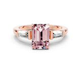 Rose gold Emerald Cut Cut Diamond Ring with Tapered Baguette Side Stones in Four-Prong Setting