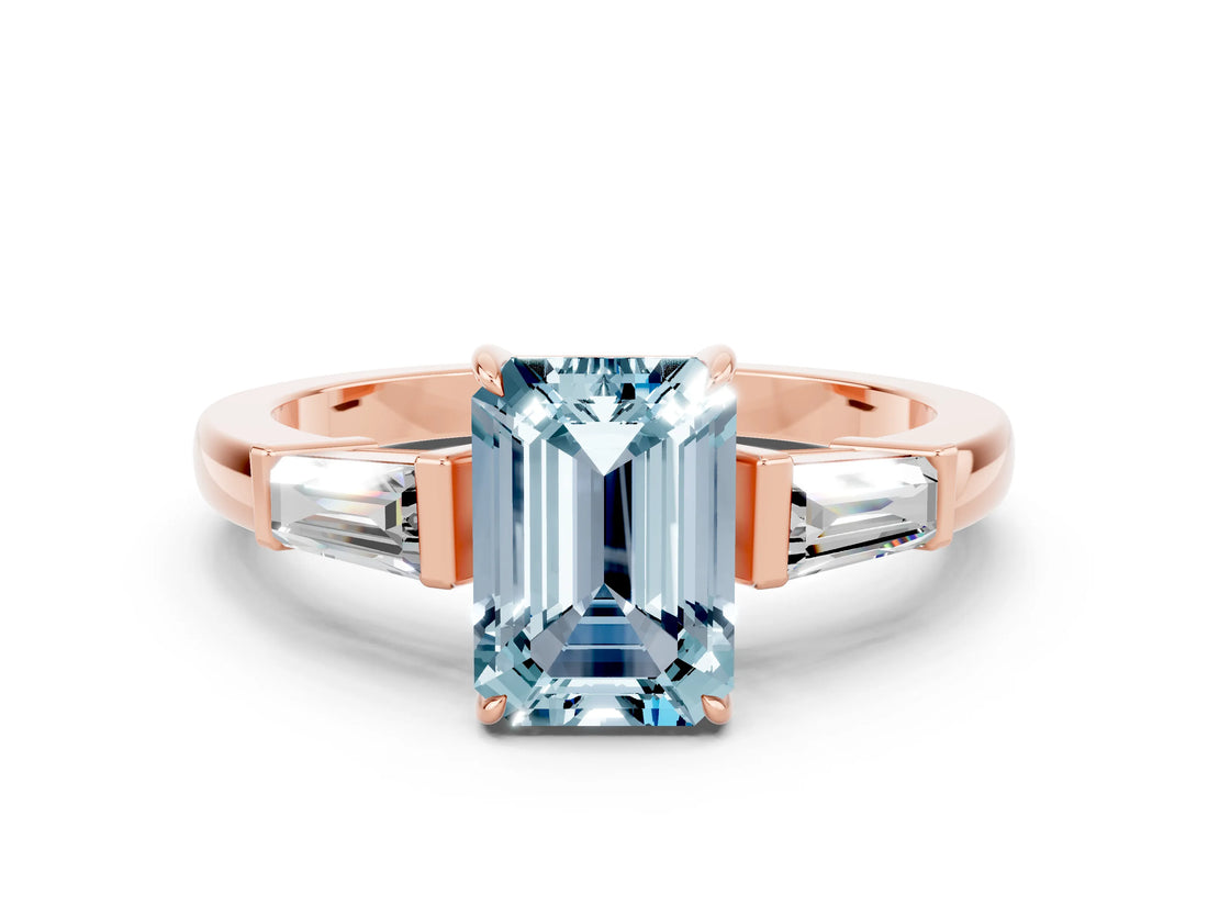 Rose gold Emerald Cut Cut Diamond Ring with Tapered Baguette Side Stones in Four-Prong Setting