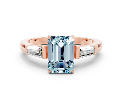 Rose gold Emerald Cut Cut Diamond Ring with Tapered Baguette Side Stones in Four-Prong Setting