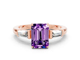 Rose gold Emerald Cut Cut Diamond Ring with Tapered Baguette Side Stones in Four-Prong Setting