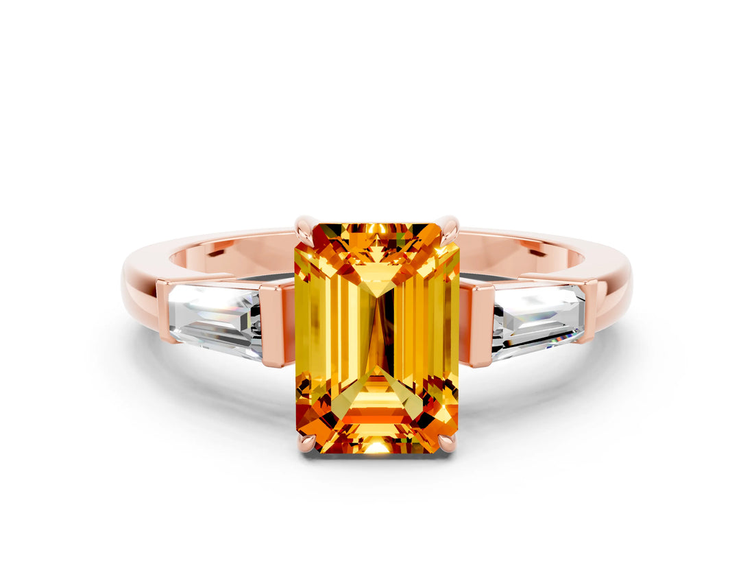 Rose gold Emerald Cut Cut Diamond Ring with Tapered Baguette Side Stones in Four-Prong Setting