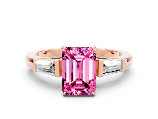 Rose gold Emerald Cut Pink Sapphire Three-Stone Ring with Tapered Baguette Side Stones and Prong Setting