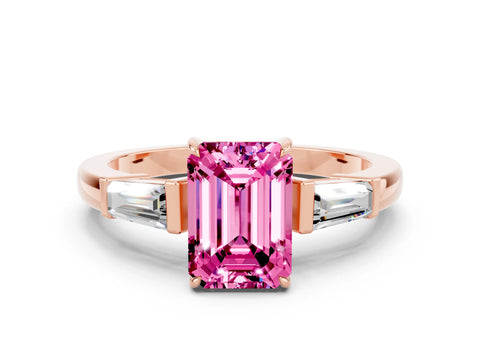 Rose gold Emerald Cut Cut Diamond Ring with Tapered Baguette Side Stones in Four-Prong Setting