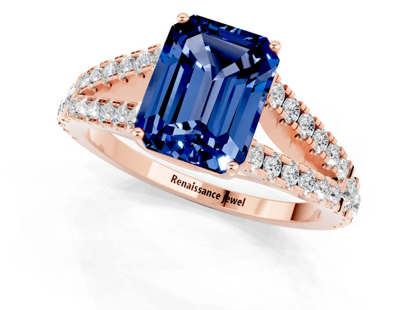Rose gold Emerald Cut Blue Sapphire Split Shank Engagement Ring with Round Pavé and Prong Setting