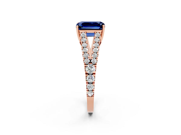 Rose gold Emerald Cut Blue Sapphire Split Shank Engagement Ring with Round Pavé and Prong Setting