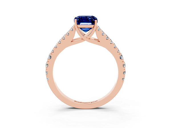 Rose gold Emerald Cut Blue Sapphire Split Shank Engagement Ring with Round Pavé and Prong Setting