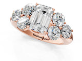 Rose gold Emerald Cut Diamond Cluster Ring with Round Accent Stones and Prong Setting on a Classic Band_63