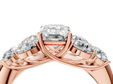 Rose gold Emerald Cut Diamond Cluster Ring with Round Accent Stones and Prong Setting on a Classic Band_66