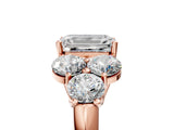 Rose gold Emerald Cut Diamond Cluster Ring with Round Accent Stones and Prong Setting on a Classic Band_67