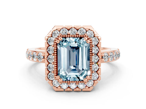 Rose gold Emerald Cut Diamond Halo Ring with Pavé Band and Prong Setting
