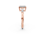 Rose gold Emerald Cut Diamond Ring with Tapered Baguette Side Stones in Four-Prong Setting_18