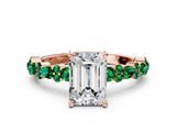 Rose gold Emerald Cut Diamond Side Stone Solitaire Ring with Round with Emerald side stone and Four-Prong Setting