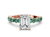 Rose gold Emerald Cut Diamond Side Stone Solitaire Ring with Round with Green Sapphire side stone and Four-Prong Setting