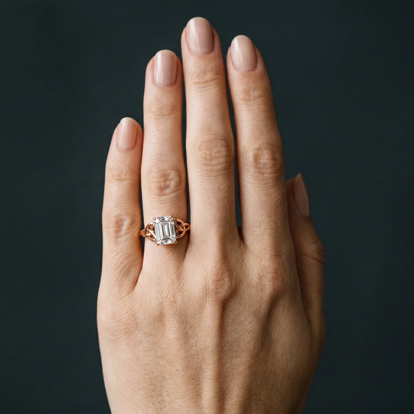 Rose gold Emerald Cut Diamond Solitaire Celtic Knot Ring with Four-Prong Setting