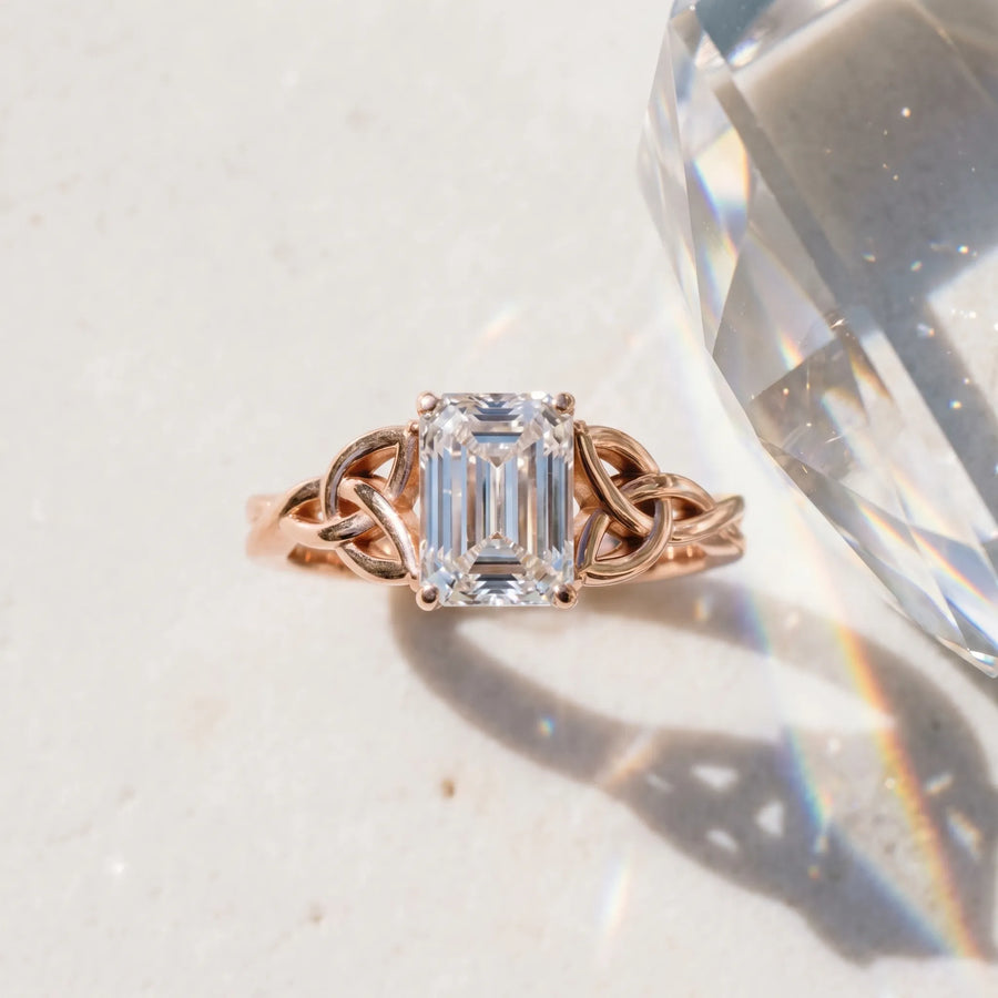 Rose gold Emerald Cut Diamond Solitaire Celtic Knot Ring with Four-Prong Setting