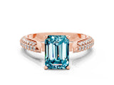 Rose gold Emerald Cut Diamond Solitaire Engagement Ring with Pavé Band and Four-Prong Setting