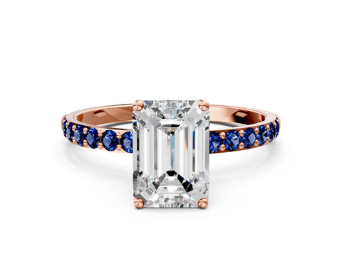 Rose gold Emerald Cut Diamond Solitaire Engagement Ring with Round with Blue Sapphire side stone Pavé Band and Prong Setting