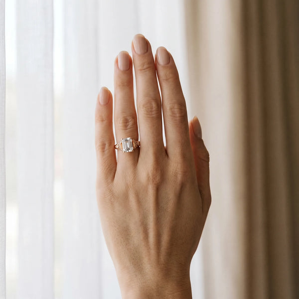 Rose gold Emerald Cut Diamond Solitaire Ring with Filigree Band and Four-Prong Setting