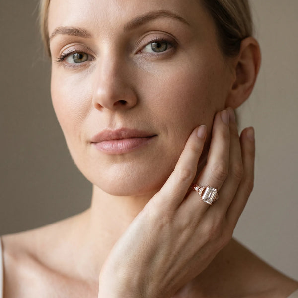 Rose gold Emerald Cut Diamond Solitaire Ring with Filigree Band and Four-Prong Setting