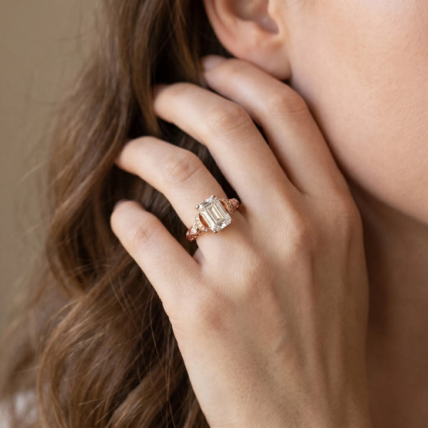 Rose gold Emerald Cut Diamond Solitaire Ring with Filigree Band and Four-Prong Setting