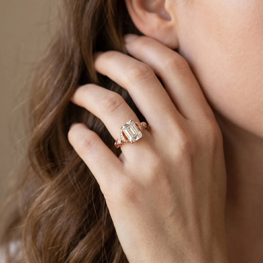 Rose gold Emerald Cut Diamond Solitaire Ring with Filigree Band and Four-Prong Setting