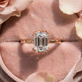 Rose gold Emerald Cut Diamond Solitaire Ring with Flower Prong Setting and Classic Band