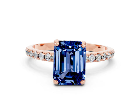 Rose gold Emerald Cut Diamond Solitaire Ring with Four-Prong Setting and Pavé Band