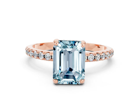 Rose gold Emerald Cut Diamond Solitaire Ring with Four-Prong Setting and Pavé Band