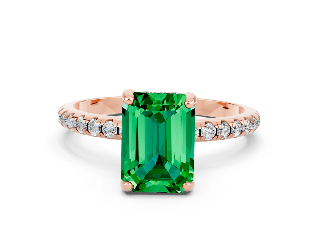 Rose gold Emerald Cut Diamond Solitaire Ring with Four-Prong Setting and Pavé Band