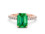Rose gold Emerald Cut Diamond Solitaire Ring with Four-Prong Setting and Pavé Band