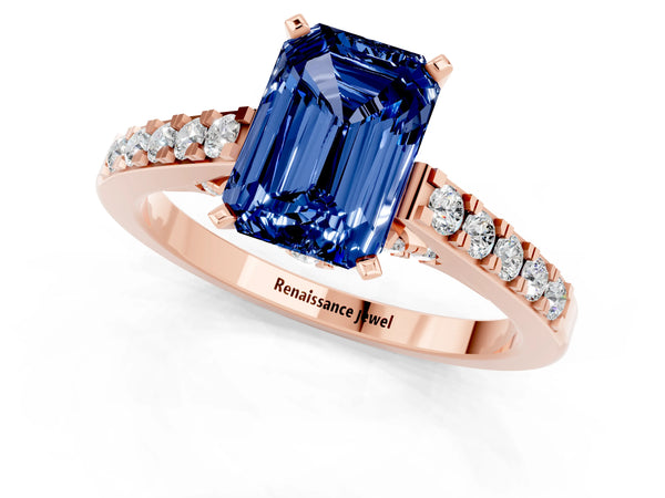 Rose gold Emerald Cut Blue Sapphire Solitaire Ring with Crossover Gallery and Round  Pavé Band