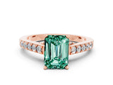 Rose gold Emerald Cut Diamond Solitaire Ring with Pavé Band and Prong Setting