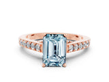 Rose gold Emerald Cut Diamond Solitaire Ring with Pavé Band and Prong Setting