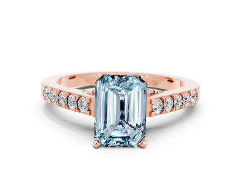 Rose gold Emerald Cut Diamond Solitaire Ring with Pavé Band and Prong Setting