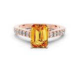 Rose gold Emerald Cut Diamond Solitaire Ring with Pavé Band and Prong Setting