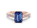 Rose gold Emerald Cut Diamond Solitaire Ring with Pavé Band and Prong Setting