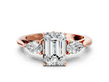 Rose gold Emerald Cut Diamond Three-Stone Ring with Pear Side Stones and Four-Prong Setting_72