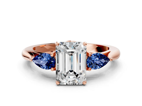 Rose gold Emerald Cut Diamond Three-Stone Ring with Pear with Blue Sapphire side stone Side Stones and Prong Setting