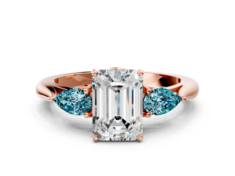 Rose gold Emerald Cut Diamond Three-Stone Ring with Pear with Blue Topaz side stone Side Stones and Prong Setting