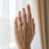 Rose gold Emerald Cut Diamond Three-Stone Ring with Round Side Stones and Pavé Band_12