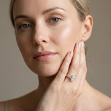 Rose gold Emerald Cut Diamond Three-Stone Ring with Round Side Stones and Pavé Band_13