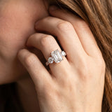 Rose gold Emerald Cut Diamond Three-Stone Ring with Round Side Stones and Pavé Band_14