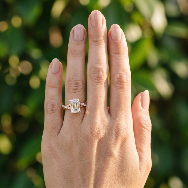 Rose gold Emerald Cut Diamond Twist Band Solitaire with Prong Setting