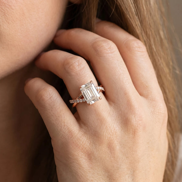 Rose gold Emerald Cut Diamond Twist Band Solitaire with Prong Setting