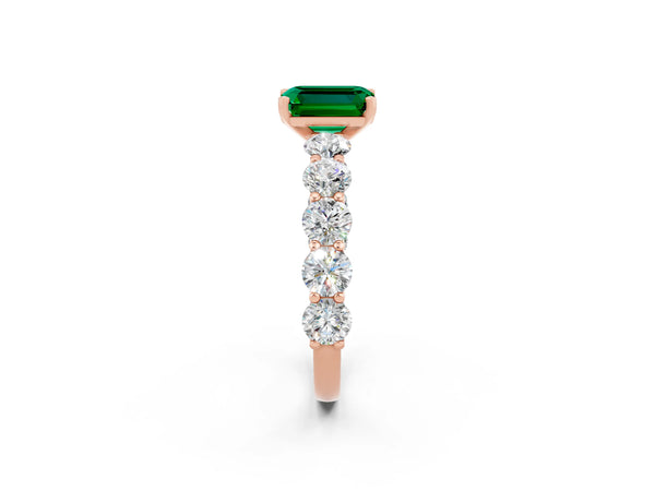 Rose gold Emerald Cut Emerald Prong Setting with Side Stones on a Pave Band