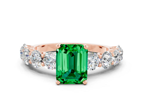 Rose gold Emerald Cut Emerald Prong Setting with Side Stones on a Pave Band