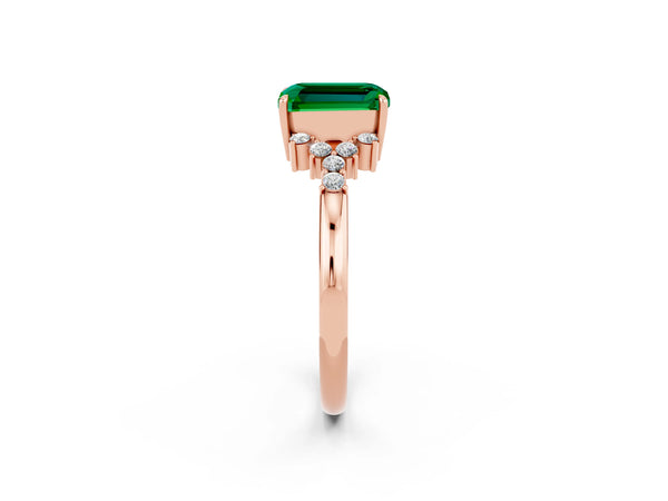 Rose gold Emerald Cut Emerald Ring with Side Stones and Four-Prong Setting