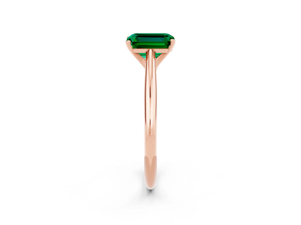 Rose gold Emerald Cut Emerald Solitaire Engagement Ring with Cathedral Setting and Four-Prong Mount